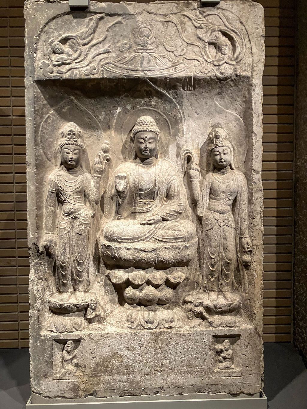 Miniature of The Buddha Amitābha with Two Attendants in a Niche